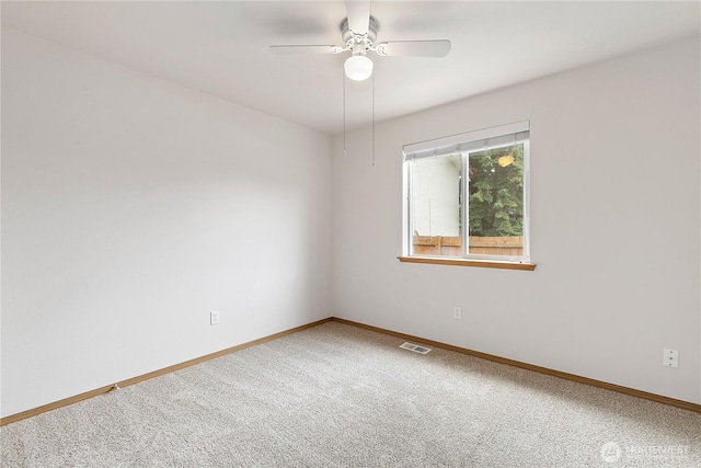 8803 136th St E, Puyallup, WA 98373 - carpeted empty room with ceiling fan and baseboards