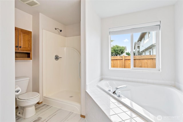 8803 136th St E, Puyallup, WA 98373 - bathroom featuring a bath and a shower