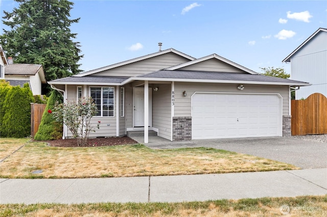 8803 136th St E, Puyallup, WA 98373 - ranch-style home with a garage and driveway