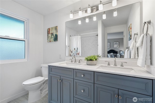 6707 SE Cougar Mountain Way Unit 2, Bellevue, WA 98006 - bathroom with double vanity and a shower with shower curtain