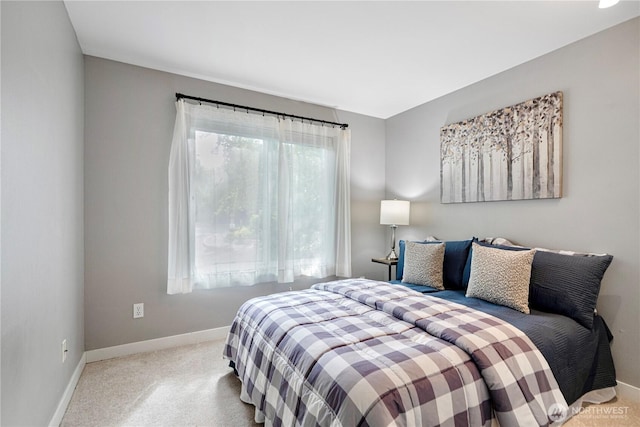 6707 SE Cougar Mountain Way Unit 2, Bellevue, WA 98006 - carpeted bedroom featuring baseboards