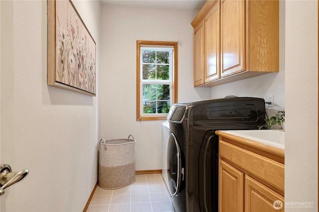 1912 243rd Pl SE, Bothell, WA 98021 - laundry area with cabinet space, separate washer and dryer, and light tile patterned floors