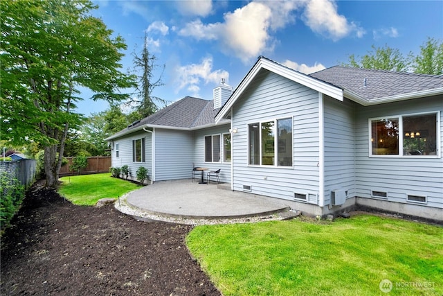 1912 243rd Pl SE, Bothell, WA 98021 - rear view of house featuring a patio, a fenced backyard, a chimney, and roof with shingles