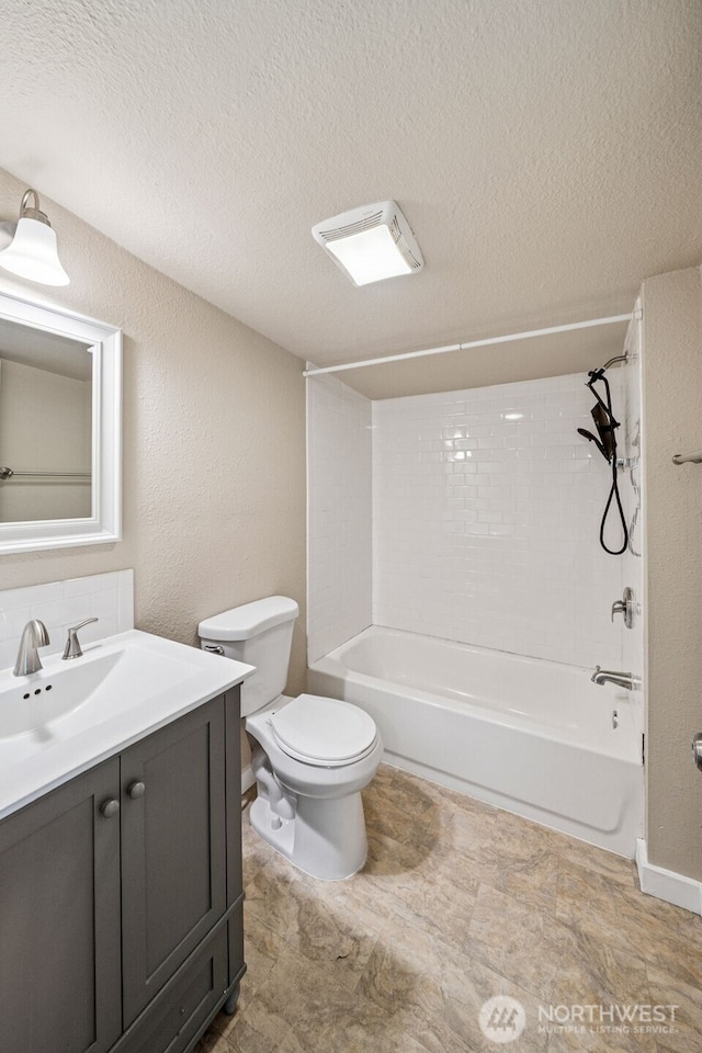 1306 Main St, Sumner, WA 98390 - bathroom with vanity, bathing tub / shower combination, and a textured ceiling