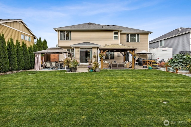 8316 230th Street Ct E, Graham, WA 98338 - rear view of property featuring a gazebo, an outdoor living space, and a patio area