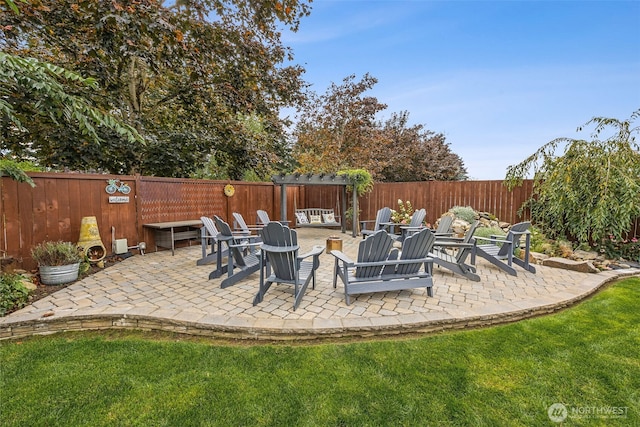 8316 230th Street Ct E, Graham, WA 98338 - fenced backyard with a patio and an outdoor fire pit