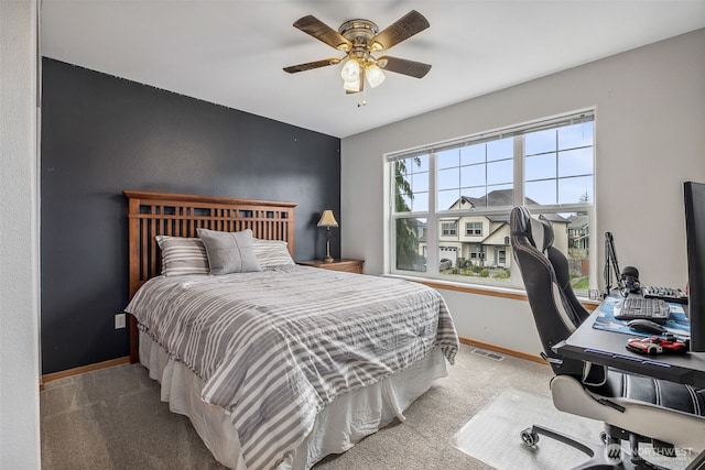 8316 230th Street Ct E, Graham, WA 98338 - carpeted bedroom with an office area and a ceiling fan