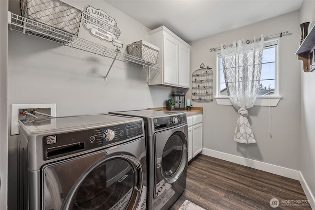 8316 230th Street Ct E, Graham, WA 98338 - washroom with independent washer and dryer, dark wood-style floors, and cabinet space