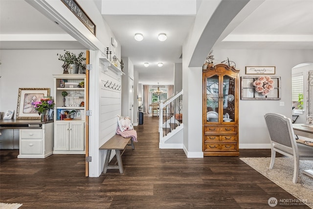 8316 230th Street Ct E, Graham, WA 98338 - entrance foyer featuring arched walkways, healthy amount of natural light, wood finished floors, and stairs