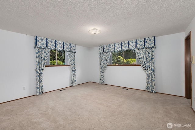 9802 124th St E, Puyallup, WA 98373 - carpeted spare room with a textured ceiling