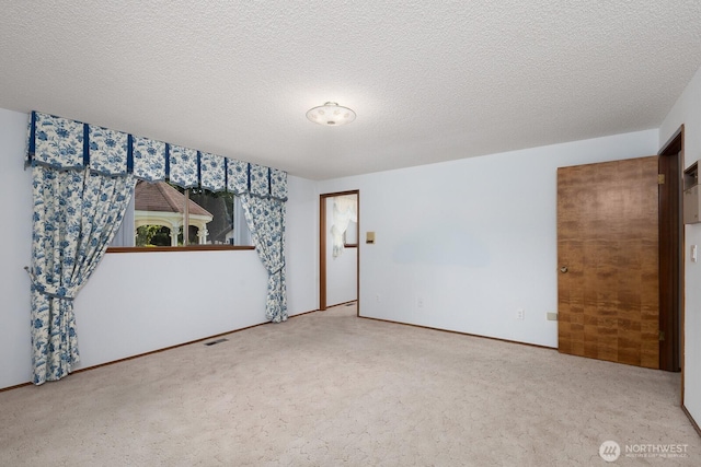 9802 124th St E, Puyallup, WA 98373 - unfurnished bedroom with carpet and a textured ceiling