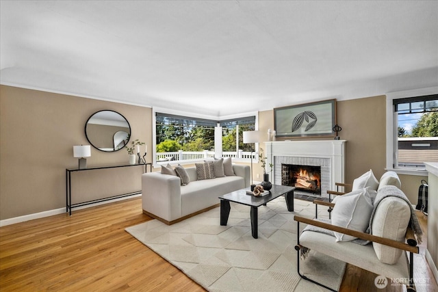 141 18th Ave, Kirkland, WA 98033 - living area featuring light wood-style flooring and a brick fireplace