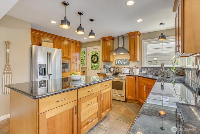 141 18th Ave, Kirkland, WA 98033 - kitchen featuring wall chimney exhaust hood, stainless steel appliances, backsplash, dark stone counters, and recessed lighting