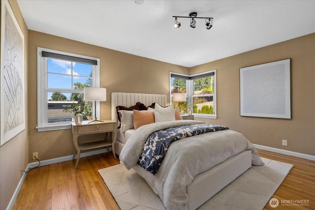141 18th Ave, Kirkland, WA 98033 - bedroom with wood finished floors and baseboards