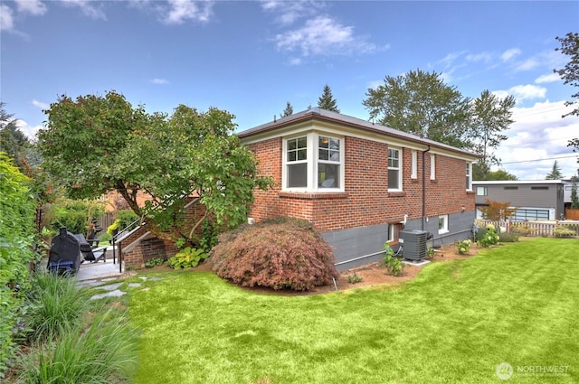 141 18th Ave, Kirkland, WA 98033 - view of side of property with brick siding and a cooling unit