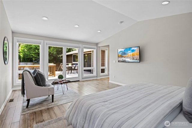 6210 105th Ave NE, Kirkland, WA 98033 - bedroom featuring lofted ceiling, wood finished floors, recessed lighting, and access to exterior