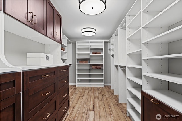 6210 105th Ave NE, Kirkland, WA 98033 - walk in closet featuring light wood finished floors