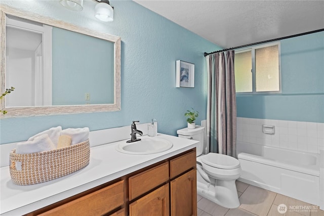 6210 105th Ave NE, Kirkland, WA 98033 - full bath featuring vanity, tile patterned floors, a textured wall, shower / tub combo with curtain, and a textured ceiling