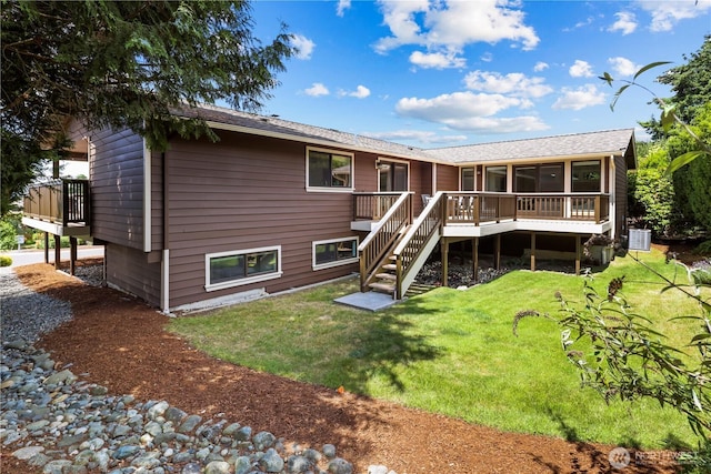 6210 105th Ave NE, Kirkland, WA 98033 - rear view of house with a deck, stairs, and a lawn
