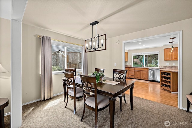 1920 11th Street Pl SW, Puyallup, WA 98371 - dining area with light colored carpet and a chandelier