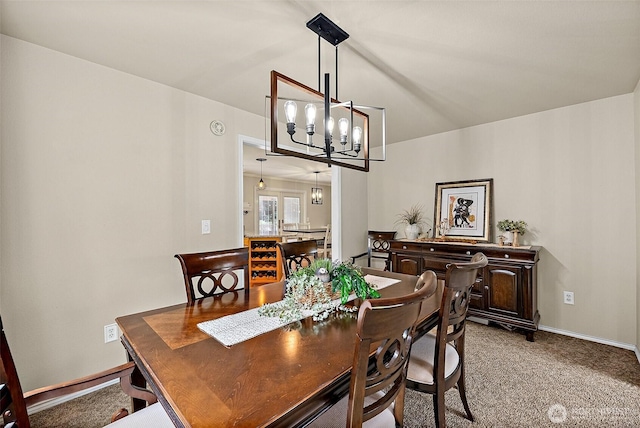 1920 11th Street Pl SW, Puyallup, WA 98371 - carpeted dining area featuring a chandelier and baseboards