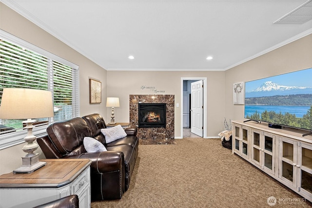 1920 11th Street Pl SW, Puyallup, WA 98371 - living area featuring light carpet, a high end fireplace, crown molding, and recessed lighting