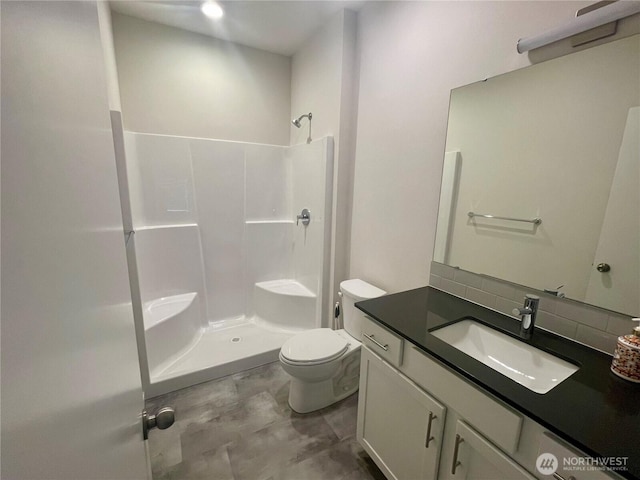 2129 Lancaster Way, Ferndale, WA 98248 - full bathroom with a shower, vanity, and backsplash