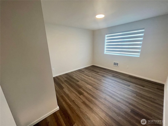2129 Lancaster Way, Ferndale, WA 98248 - empty room with dark wood-style flooring and baseboards