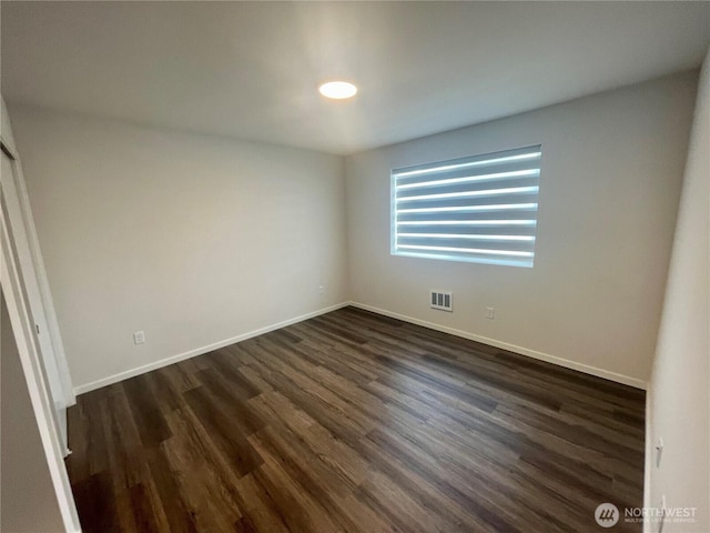 2129 Lancaster Way, Ferndale, WA 98248 - empty room featuring dark wood-style floors and baseboards