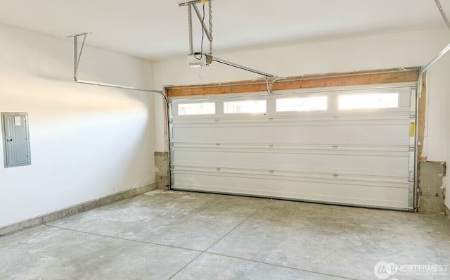 2129 Lancaster Way, Ferndale, WA 98248 - garage with electric panel and a garage door opener