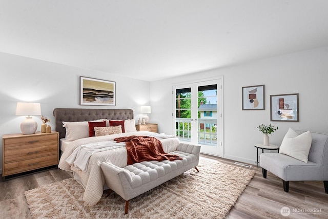 17805 NE 29th St, Redmond, WA 98052 - bedroom with access to outside and wood finished floors