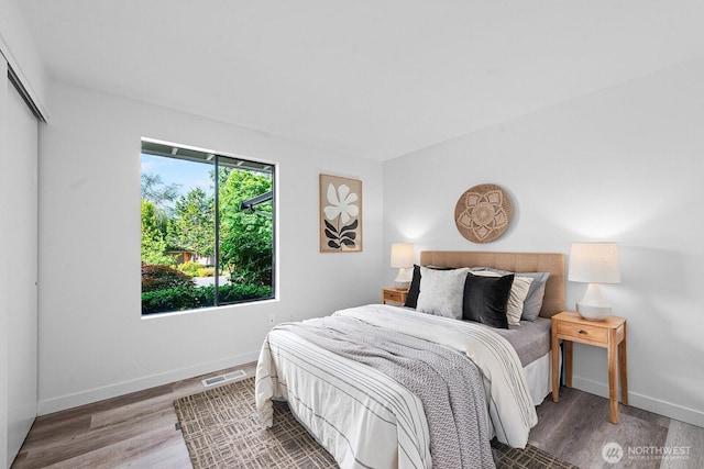 17805 NE 29th St, Redmond, WA 98052 - bedroom with wood finished floors and a closet