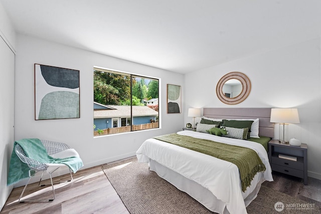 17805 NE 29th St, Redmond, WA 98052 - bedroom with baseboards and wood finished floors