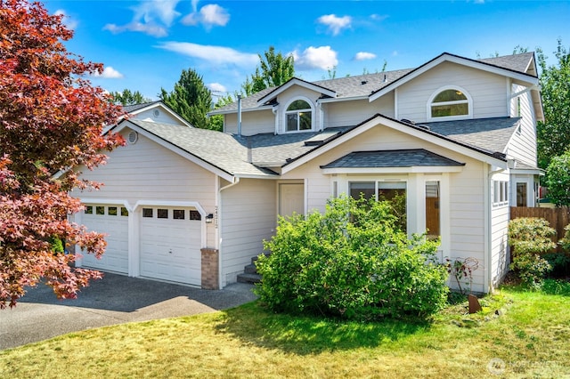 24212 13th Pl W, Bothell, WA 98021 - traditional-style home featuring a shingled roof, driveway, and a garage