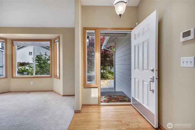24212 13th Pl W, Bothell, WA 98021 - foyer entrance with light wood-style floors and baseboards
