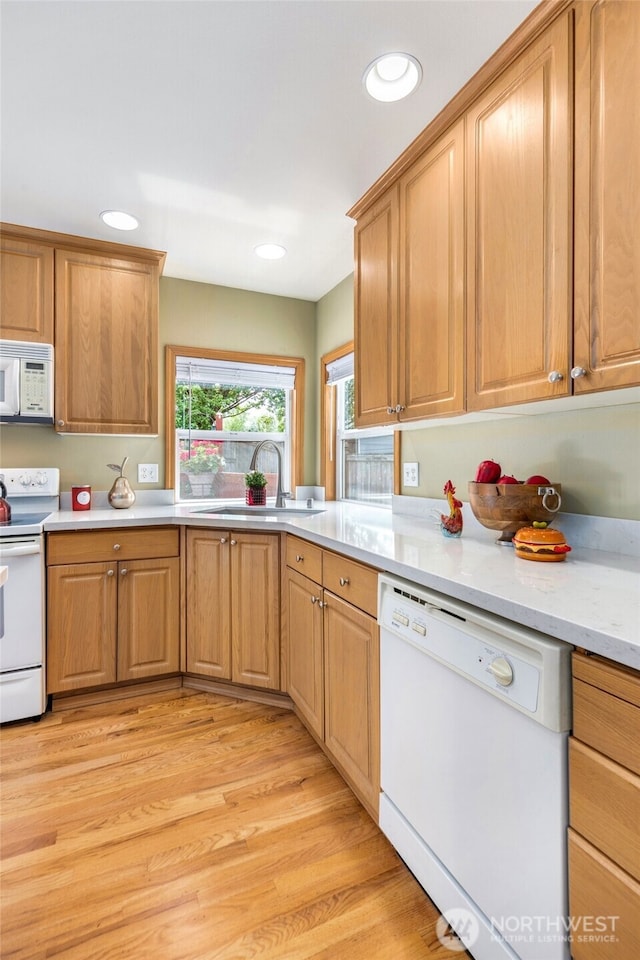 24212 13th Pl W, Bothell, WA 98021 - kitchen with white appliances, light countertops, recessed lighting, and light wood-type flooring