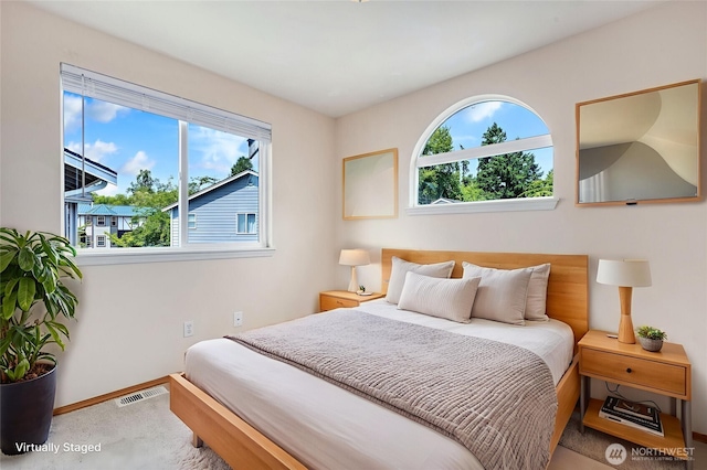 24212 13th Pl W, Bothell, WA 98021 - carpeted bedroom featuring multiple windows