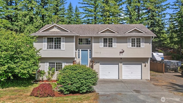 15725 Wallace Falls Loop Rd, Gold Bar, WA 98251 - bi-level home with driveway and an attached garage