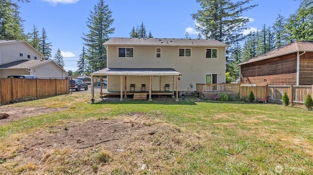 15725 Wallace Falls Loop Rd, Gold Bar, WA 98251 - rear view of property with a fenced backyard and a deck