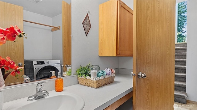 15725 Wallace Falls Loop Rd, Gold Bar, WA 98251 - bathroom with washer / dryer and vanity