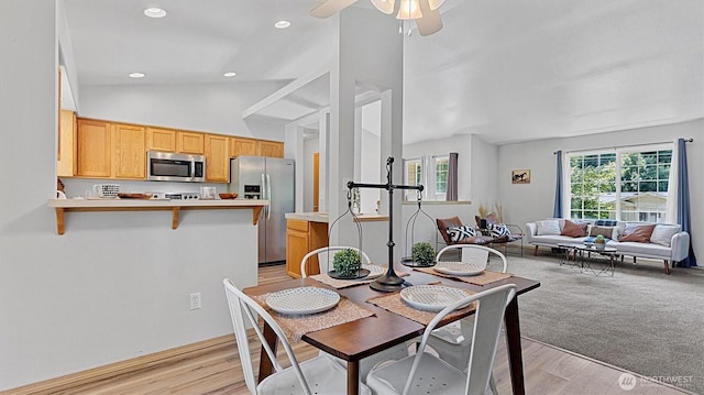 15725 Wallace Falls Loop Rd, Gold Bar, WA 98251 - dining space with vaulted ceiling, a ceiling fan, light wood finished floors, and recessed lighting