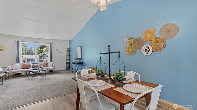 15725 Wallace Falls Loop Rd, Gold Bar, WA 98251 - dining space featuring wood finished floors, vaulted ceiling, and ceiling fan
