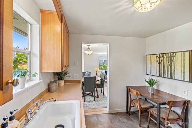 5065 SW Olga St, Seattle, WA 98116 - dining area with baseboards