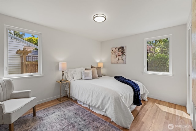 5065 SW Olga St, Seattle, WA 98116 - bedroom with wood finished floors
