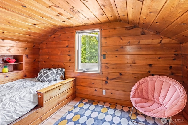 5065 SW Olga St, Seattle, WA 98116 - bedroom featuring a sauna, lofted ceiling, wood walls, wood finished floors, and wooden ceiling