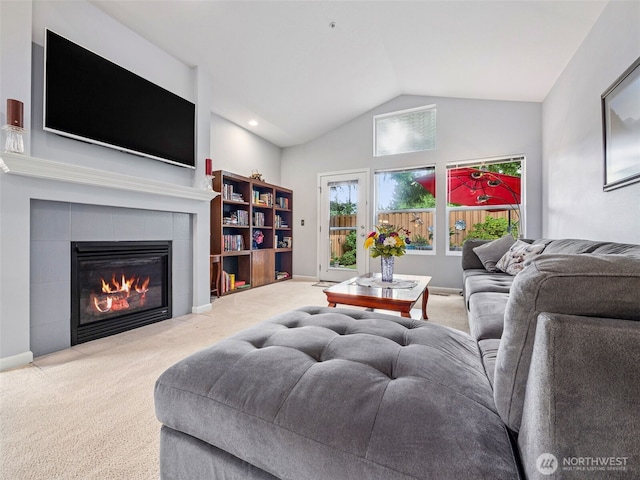 5909 Panorama Dr SE Unit 8-101, Auburn, WA 98092 - living room featuring carpet flooring, vaulted ceiling, and a fireplace