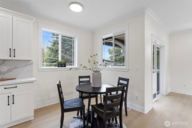 15006 Old Manor Way, Lynnwood, WA 98087 - dining room with light wood finished floors and ornamental molding