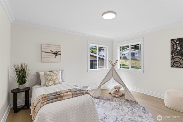 15006 Old Manor Way, Lynnwood, WA 98087 - bedroom with crown molding and wood finished floors