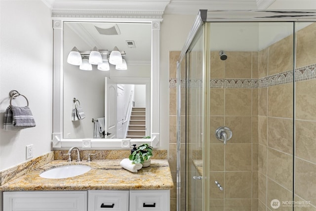 15006 Old Manor Way, Lynnwood, WA 98087 - bathroom featuring a shower stall, vanity, and crown molding
