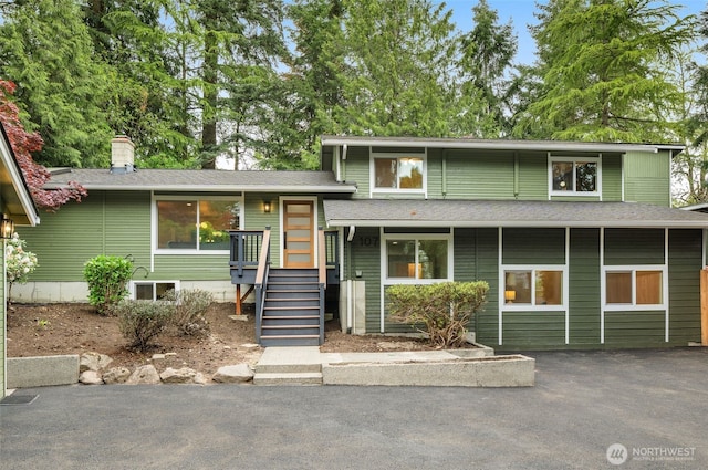 107 219th Pl SE, Bothell, WA 98021 - view of front of house featuring a chimney